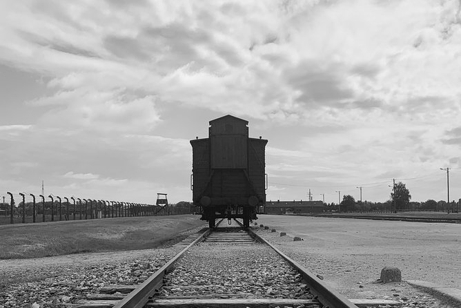Auschwitz-Birkenau guided tour from Krakow with a private transport - Entering Auschwitz I with an English-speaking guide