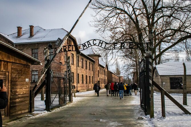Auschwitz-Birkenau Guided Tour from Krakow with Hotel Pickup - Entering Auschwitz I and its original buildings