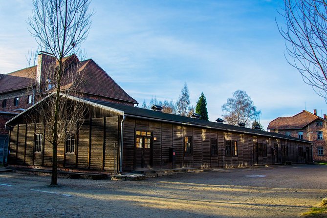 Auschwitz Birkenau Guided Tour with Ticket Hotel Pickup Small Van - What the fixed pace means for you