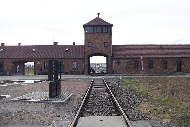 Auschwitz Tours Memorial and Museum Guided Tour from Krakow - What the $74.65 price really covers