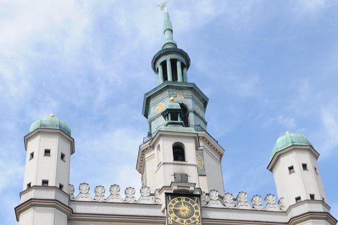Discover Poznan: Walk, Take a tram and have a traditional snack - Starting beneath Poznań’s famous mechanical goats