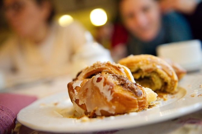 Discover Poznan: Walk, Take a tram and have a traditional snack - A short walk to the medieval walls
