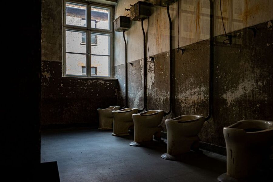 From Krakow: Auschwitz-Birkenau Full-Day Guided Tour - Auschwitz I and the Gate With Its Infamous Message