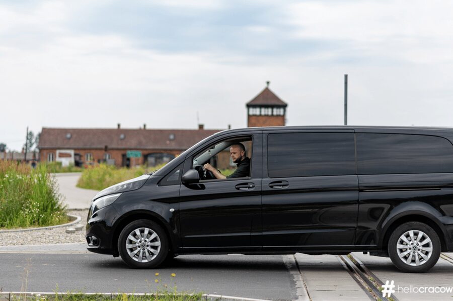 From Krakow: Auschwitz-Birkenau Guided Tour Guaranteed Time - Entering Auschwitz I through Arbeit macht frei