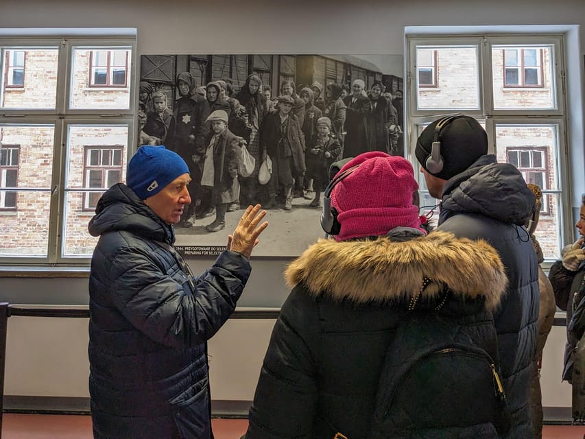 From Krakow: Auschwitz-Birkenau Guided Tour & Hotel Pickup - Auschwitz I and the Arbeit Macht Frei gate