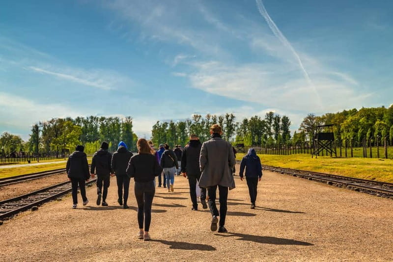 From Krakow: Auschwitz-Birkenau Guided Tour & Transport - How the guide and tour leader work together