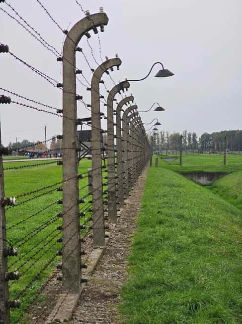 From Krakow: Auschwitz-Birkenau Guided Tour with Pickup - Leaving Krakow in an air-conditioned van