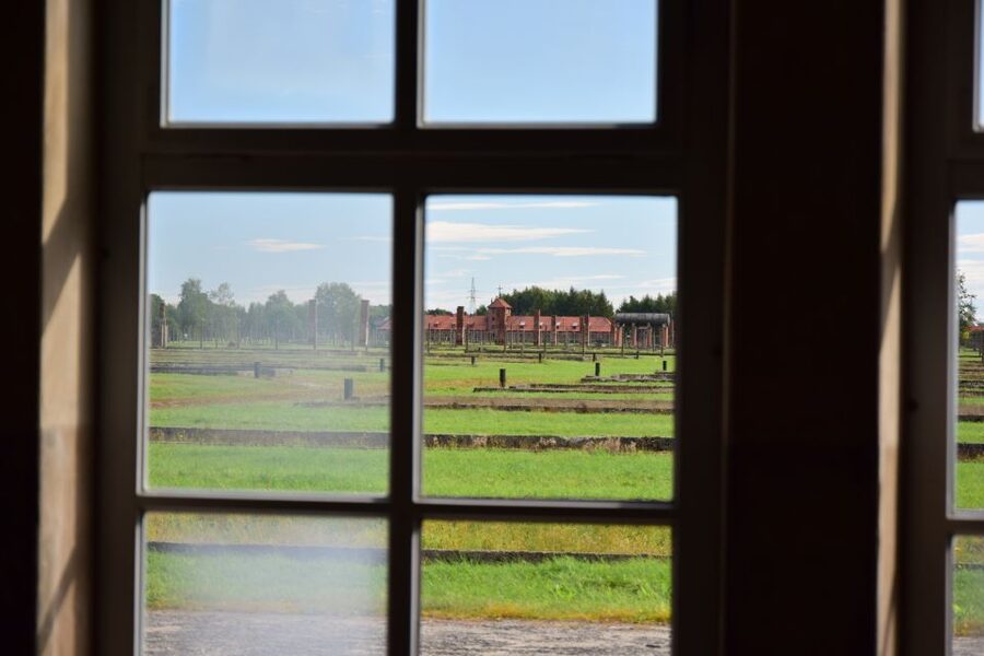From Krakow: Auschwitz-Birkenau Tour with Transportation - Crossing to Birkenau Memorial