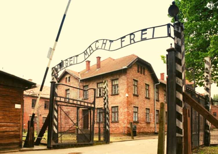 From Warsaw: Auschwitz Day Tour by Private Car with Lunch - Entering Auschwitz Through the Arbeit Macht Frei Gate