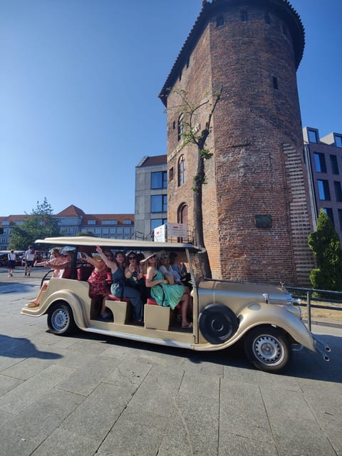 Gdansk: City Sightseeing Tour Eco Electric Buggy Golf Cart ! - The railway station, Great Mill, and Market Hall