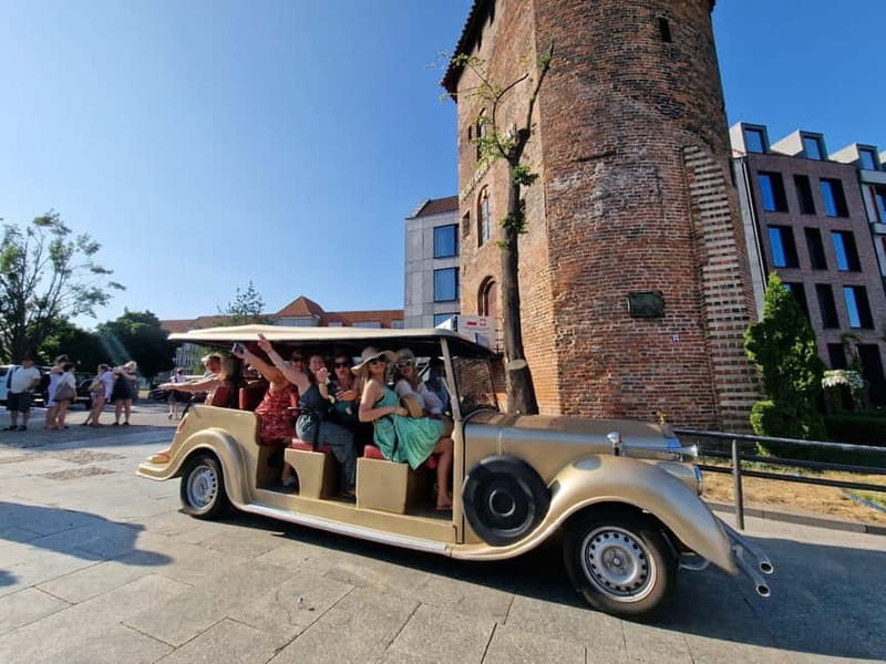 Gdansk: City Tour Sightseeing Golf Cart Main City District - The Golden Gate leads toward the Royal Road