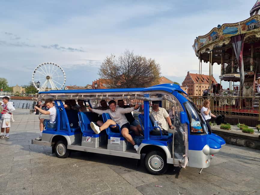 Gdansk:Private Beer City Tour Sightseeing By Golf Cart - Churches that shape the Old Town view