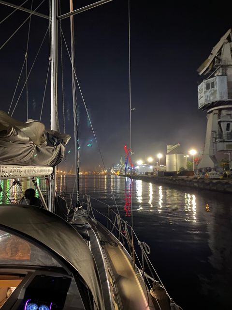 Gdansk: Scenic Evening Yacht Cruise with Welcome Drink - The drink, blankets, and two-deck setup