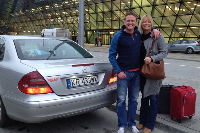 Krakow Airport-City Center and Back -private 2 ways transfer - Arriving at Krakow Airport with a name-board pickup