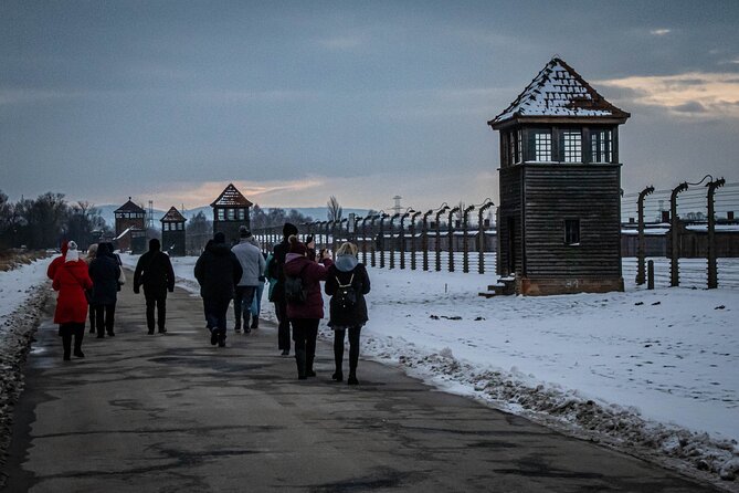 Krakow: Auschwitz-Birkenau Guided Tour with Ticket and Transfer - Transport, breaks, food, and walking
