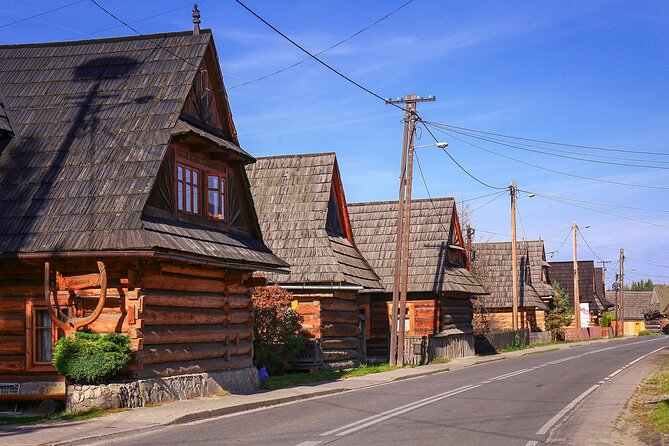 Kraków: Explore Zakopane Tatra Mountain and optional Thermal Bath - Chochołów cheese, cottage food, and Polish vodka