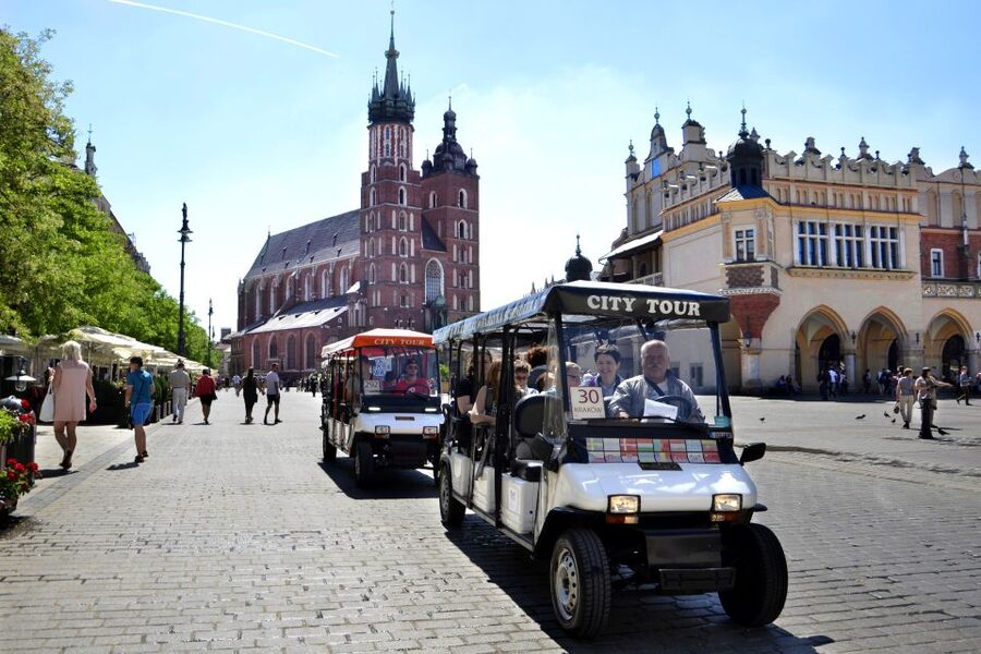 Krakow: Full Tour Regular 1.5h guided city tour by E-Cart - The audio guide in 28 languages