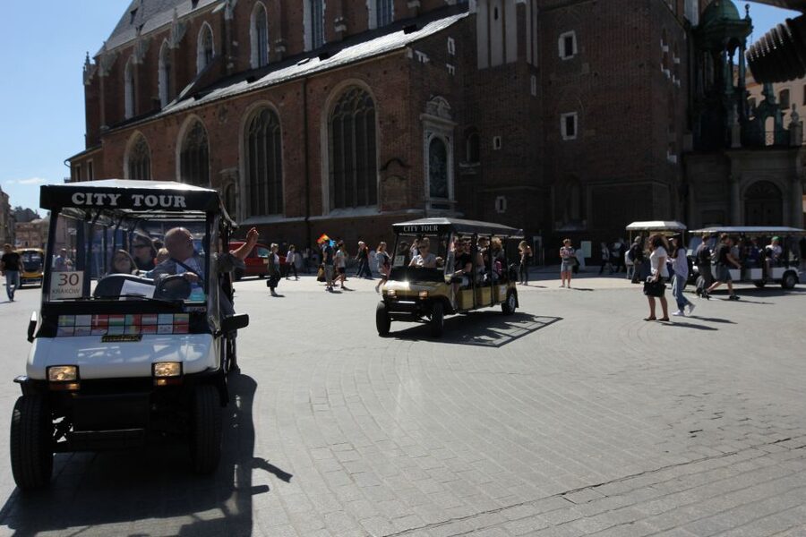 Krakow: Full Tour Regular 1.5h guided city tour by E-Cart - Jack and the human side of the ride