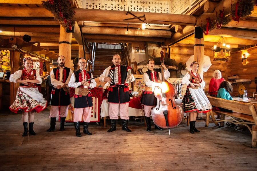 Krakow: Full Traditional Polish Dinner & Folk Show - Entering Skansen Smaków near Kryspinów Lake