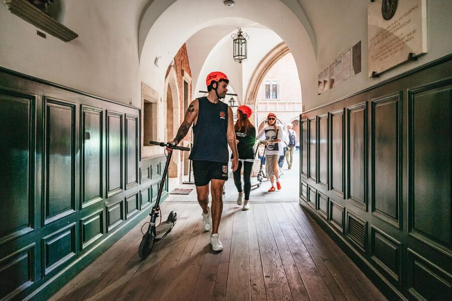 Krakow: Guided E-Scooter City Tour with Food Tastings - What the guides add to the experience