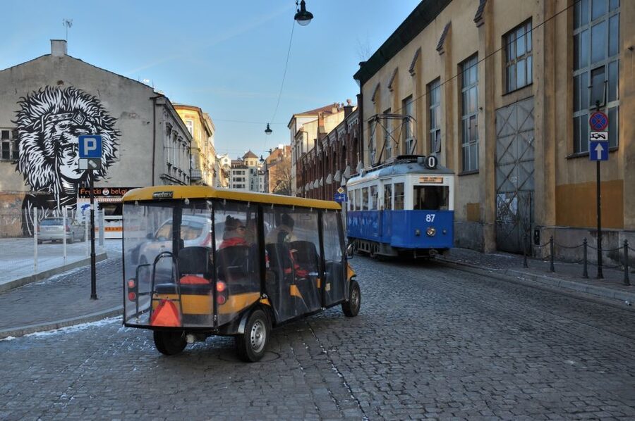 Krakow: Jewish Quarter and Ghetto Sightseeing Golf Cart Tour - Crossing from Kazimierz to the former Jewish ghetto
