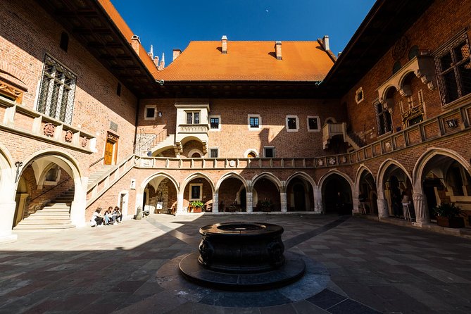 Krakow: Old Town Guided Walking Tour - Walking Floriańska, Grodzka, and Kanonicza