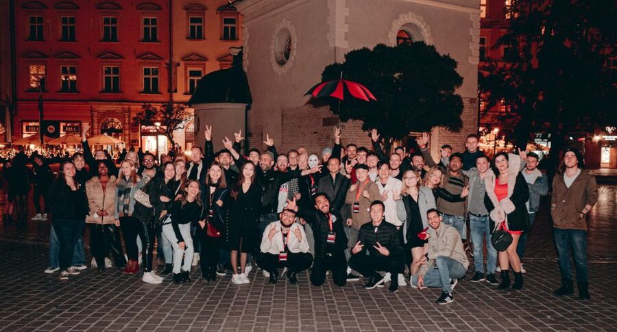 Krakow: Pub Crawl with 1 Hour of Unlimited Alcoholic Drinks - Meeting the guides beneath St. Wojciech Church