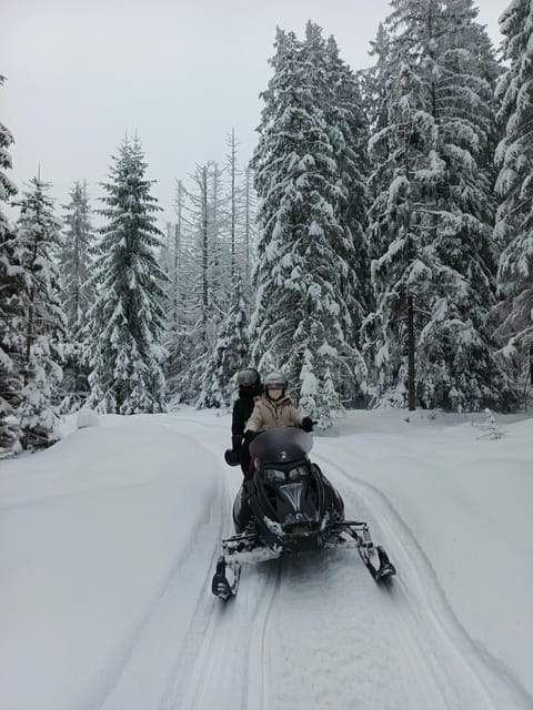 Krakow: Snowmobile & Thermal Baths Zakopane Full Day Tour - Snowmobile riding with Tatra Mountain views