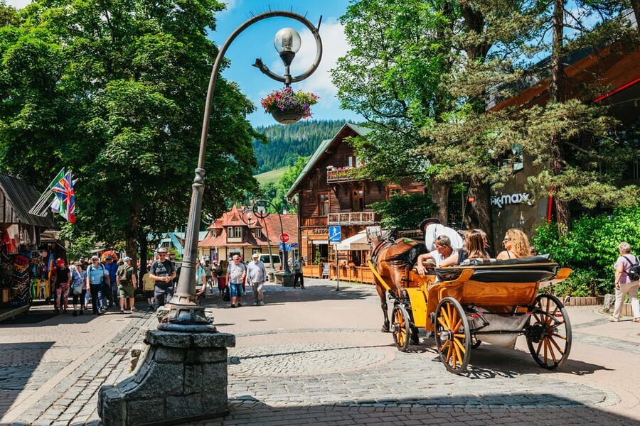 Krakow: Zakopane Tour with Thermal Baths, Cable Car & Pickup - Riding the Gubałówka funicular above Zakopane