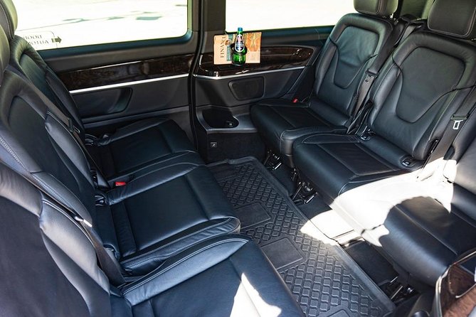 Luxury Warsaw Chopin Airport Transfer by private Minivan car - The 20-minute walk to a waiting Mercedes