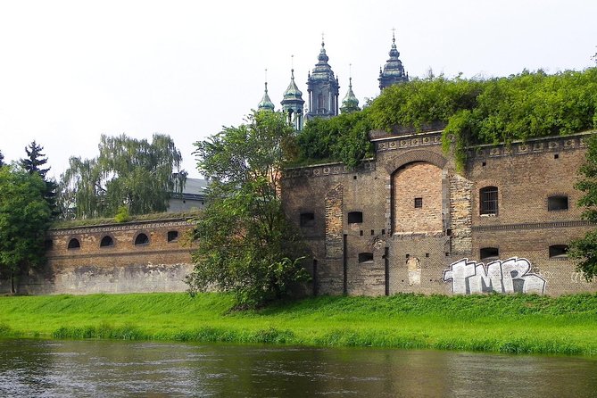 Poznan: Srodka District and Cathedral Island Private Walking Tour - Town Hall, fountains, and the stories in the square