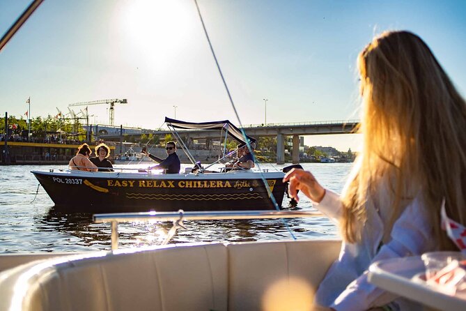 Rental of Motorboat for 5 on Vistula in Warsaw no Licenses Needed - Snacks, drinks, and the JBL speaker