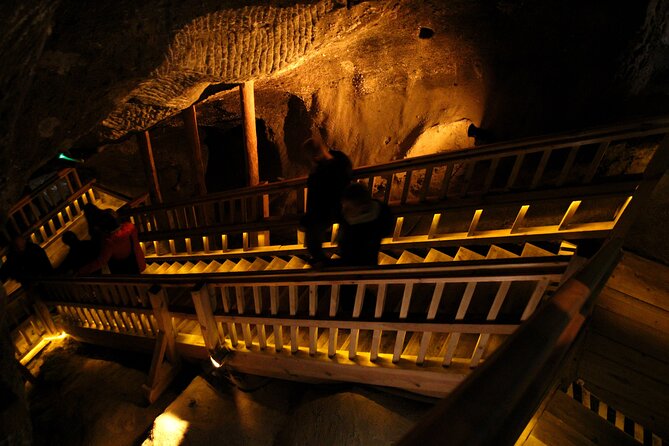 Salt Mine Wieliczka Guided Tour from Krakow - Salt carvings, statues, and working machinery