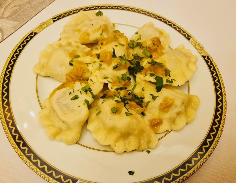Taste of Poland, food tour and guided walk with 12 tasting - Meeting by Zachwatowicz’s statue