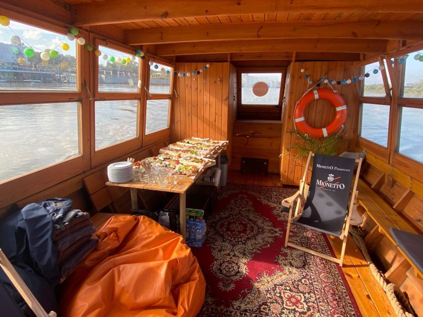 Warsaw: Vistula River Sunset Cruise with Welcome Drink - The first stretch past Copernicus Science Center
