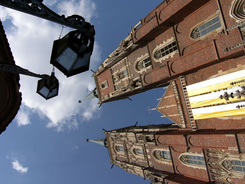 Wroclaw: City Walk and Cruise by Luxury Solar Catamaran - The Fencer Fountain and the naked students
